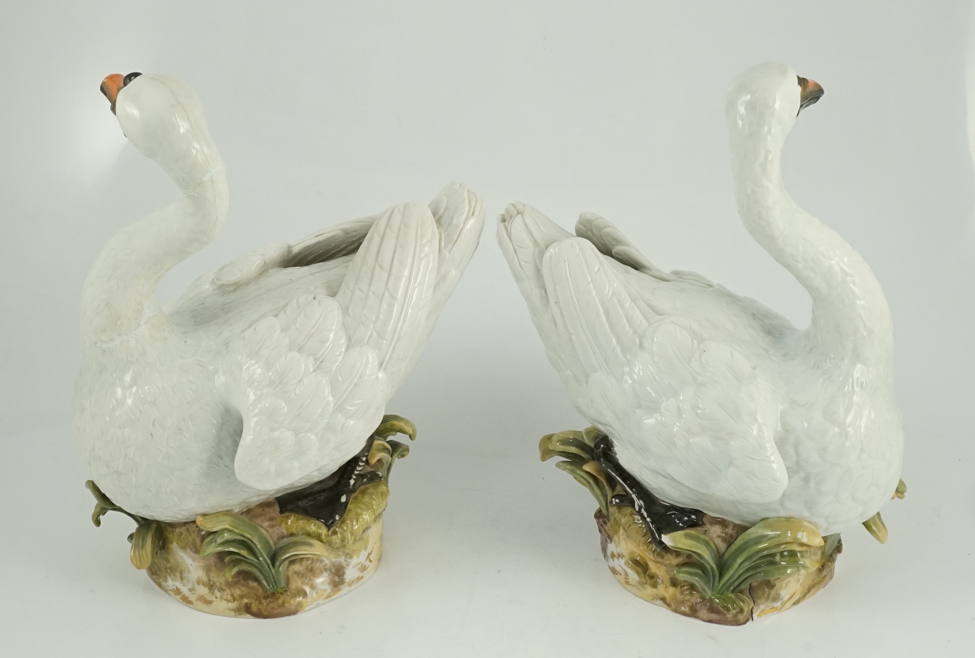 A pair of large Meissen models of swans, 19th century, one neck restored